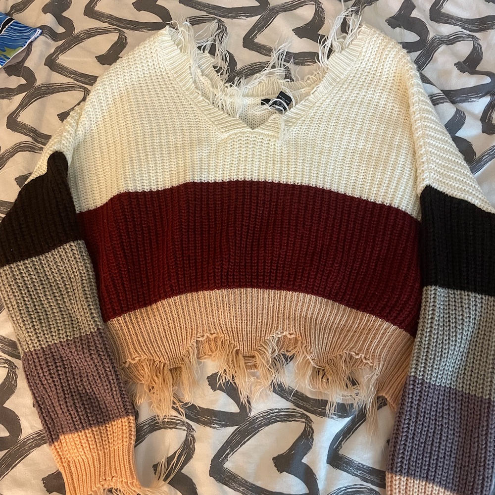 A small (fits big) baggy cropped sweater from Rue 21